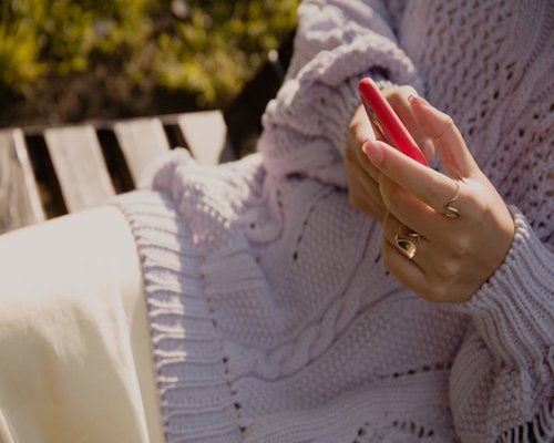 Person holding phone at a comfortable distance